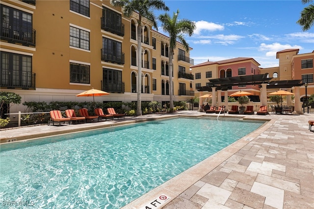 pool with a patio