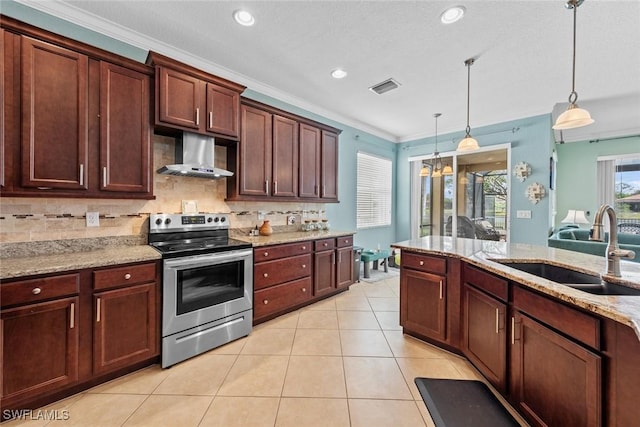 kitchen featuring stainless steel electric range oven, visible vents, light tile patterned flooring, a sink, and wall chimney range hood