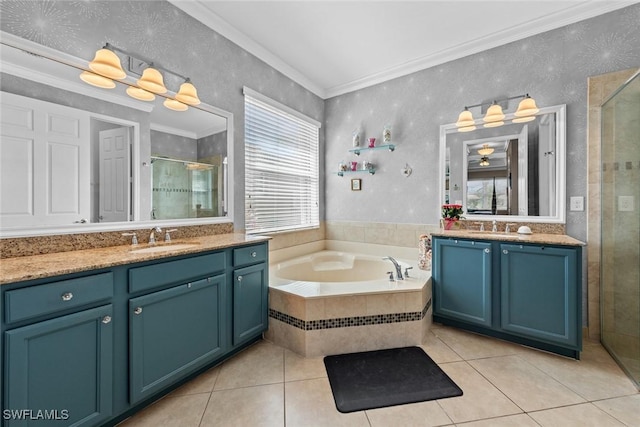 bathroom featuring a garden tub, tile patterned flooring, a sink, ornamental molding, and a shower stall