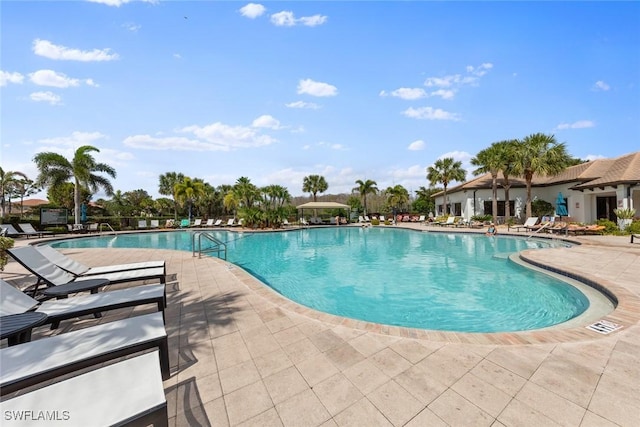 community pool with a patio