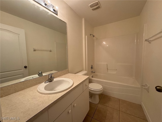 full bathroom with visible vents, toilet, vanity,  shower combination, and tile patterned floors