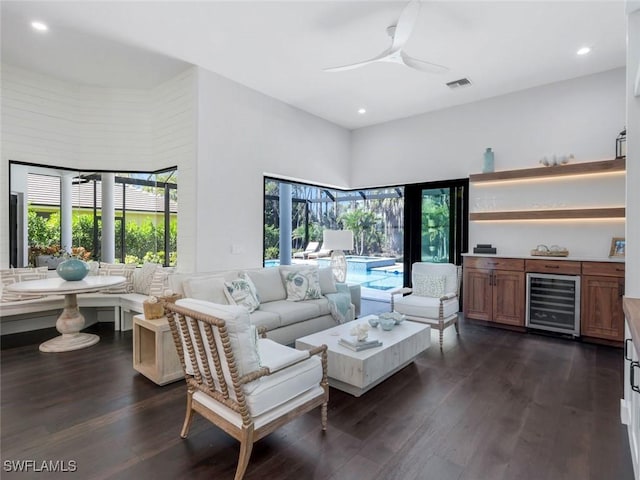 living room with wine cooler, visible vents, dark wood finished floors, and recessed lighting