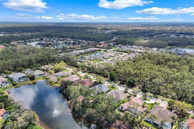 aerial view with a residential view and a water view