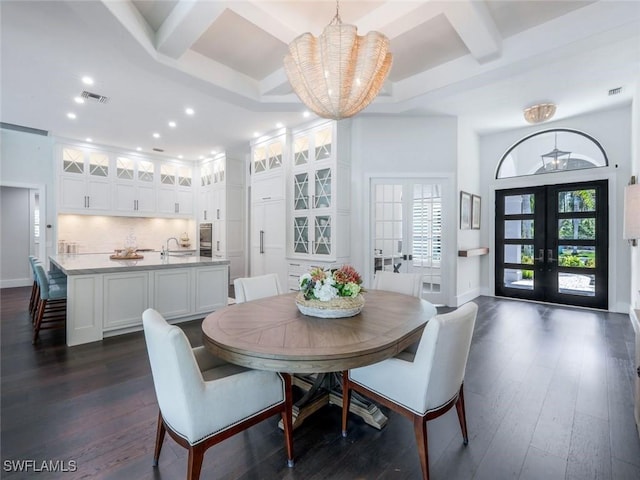 dining space featuring coffered ceiling, french doors, visible vents, and dark wood-style floors