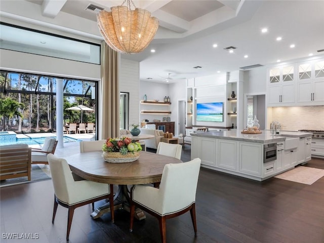 dining room with recessed lighting, beam ceiling, visible vents, and dark wood finished floors