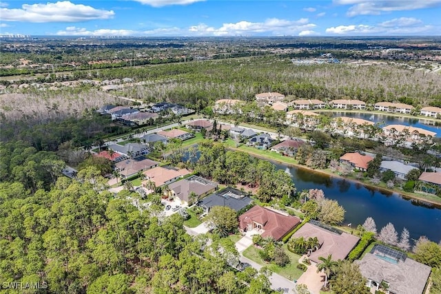 aerial view with a residential view and a water view