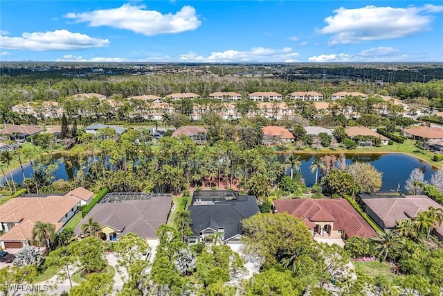 aerial view with a water view and a residential view