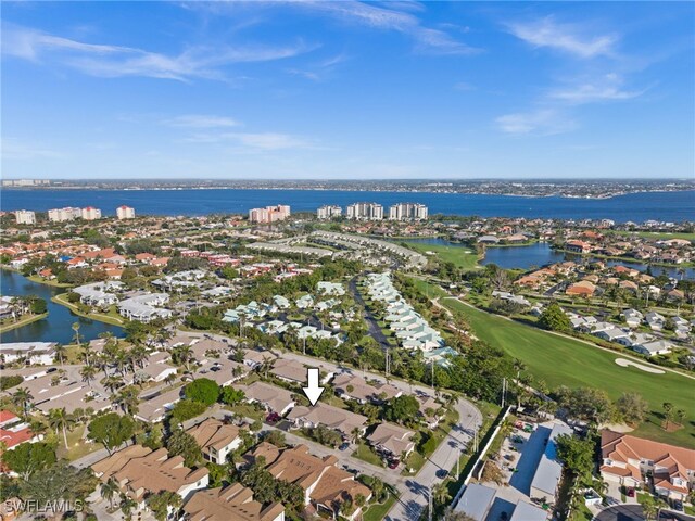 aerial view with a water view and a residential view