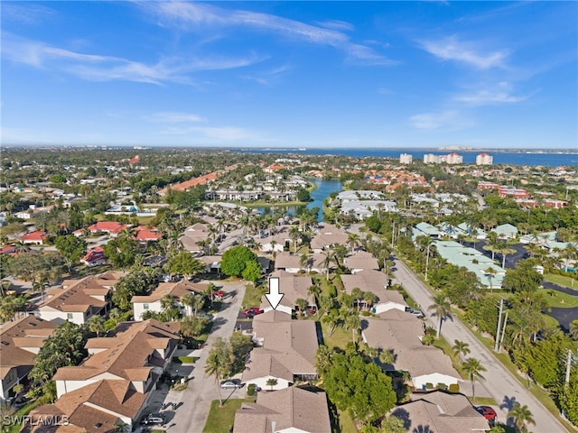 aerial view with a water view and a residential view