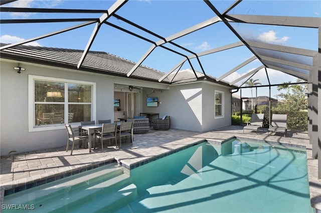 pool featuring a patio area and a lanai