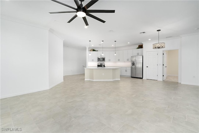 unfurnished living room with ornamental molding, visible vents, baseboards, and a ceiling fan