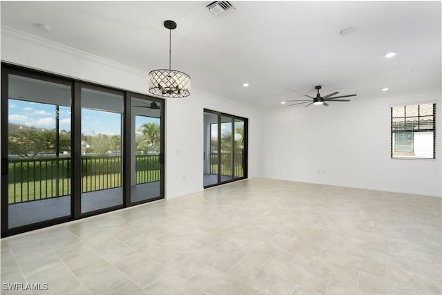 spare room with baseboards, visible vents, a ceiling fan, crown molding, and recessed lighting