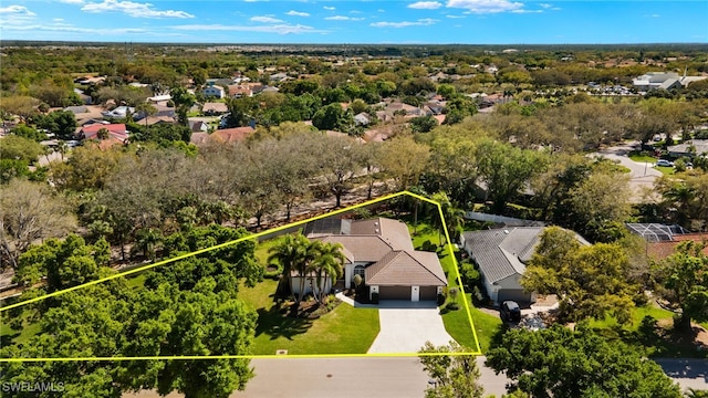11211 Mahogany Run, Fort Myers, FL 33913 - aerial perspective of suburban area featuring property boundaries highlighted and a tree filled landscape
