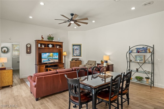 dining space featuring recessed lighting, ceiling fan, light wood-style flooring, and baseboards