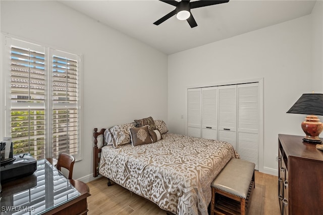 11211 Mahogany Run, Fort Myers, FL 33913 - bedroom with light wood-type flooring, a closet, and ceiling fan