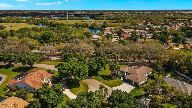 aerial view with a water view and a residential view