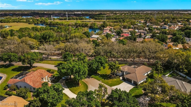 11211 Mahogany Run, Fort Myers, FL 33913 - aerial view of residential area with a nearby body of water