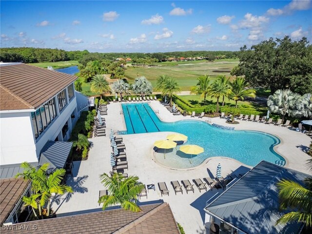 pool with a patio area