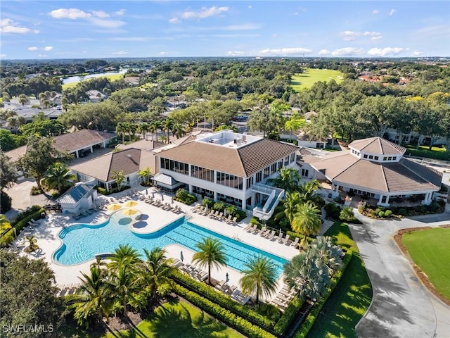 11211 Mahogany Run, Fort Myers, FL 33913 - aerial view of a pool and a tree filled landscape