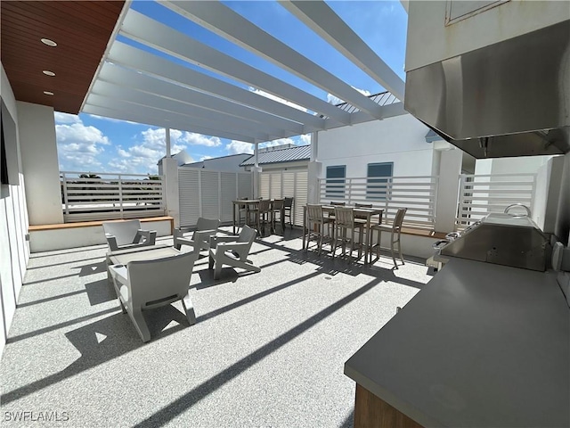 view of patio / terrace with outdoor dining space and a pergola