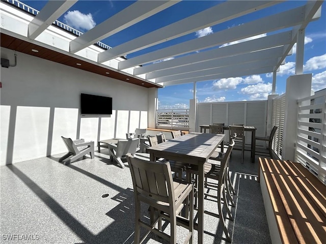 view of patio featuring outdoor dining area