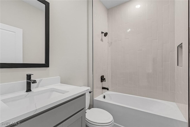 605 SW 21st Ter, Cape Coral, FL 33991 - bathroom featuring toilet, vanity, and shower / bathtub combination