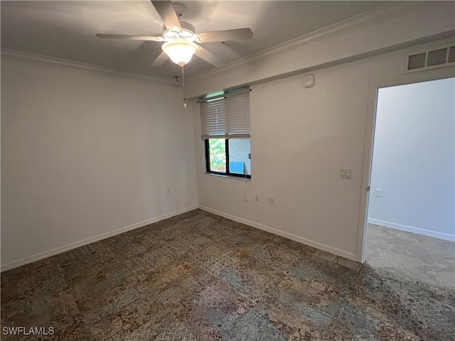 empty room featuring baseboards, visible vents, ceiling fan, and crown molding