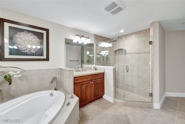 full bathroom featuring a stall shower, visible vents, vanity, and tile patterned floors