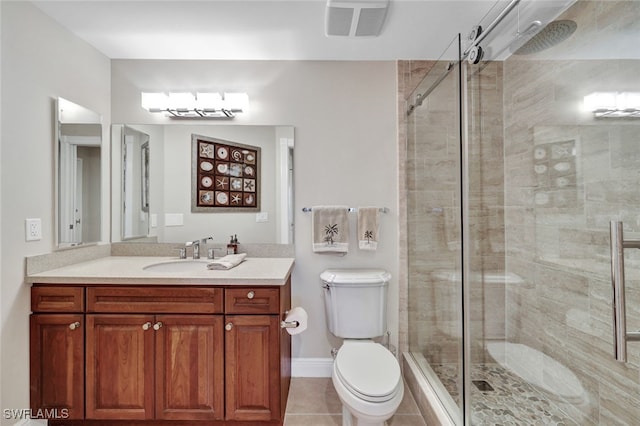 full bathroom with visible vents, toilet, tile patterned floors, vanity, and a shower stall