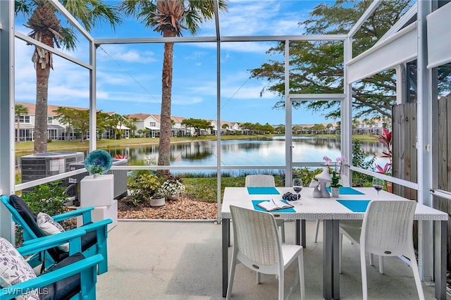 sunroom with a water view