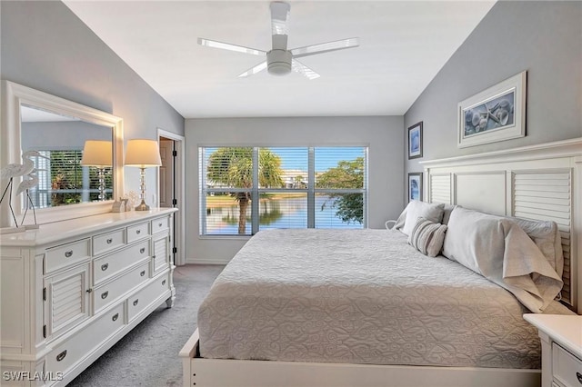 bedroom featuring carpet floors, multiple windows, and a ceiling fan