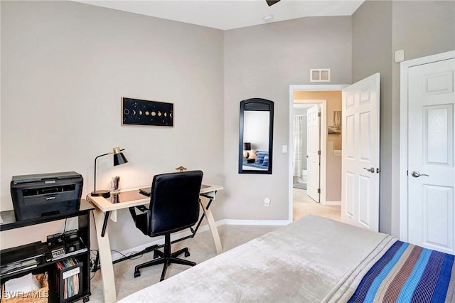 interior space with carpet flooring, visible vents, and baseboards