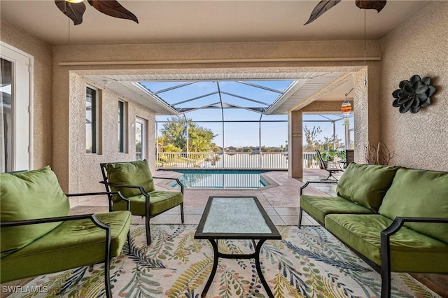 view of patio with glass enclosure, an outdoor hangout area, and a fenced in pool