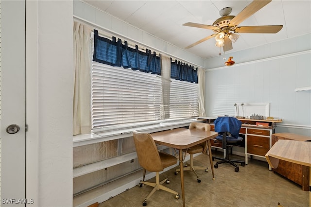 office area with a ceiling fan