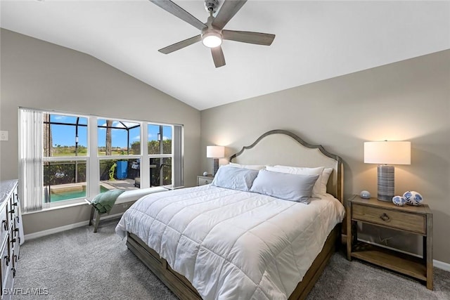 bedroom with light carpet, vaulted ceiling, baseboards, and ceiling fan