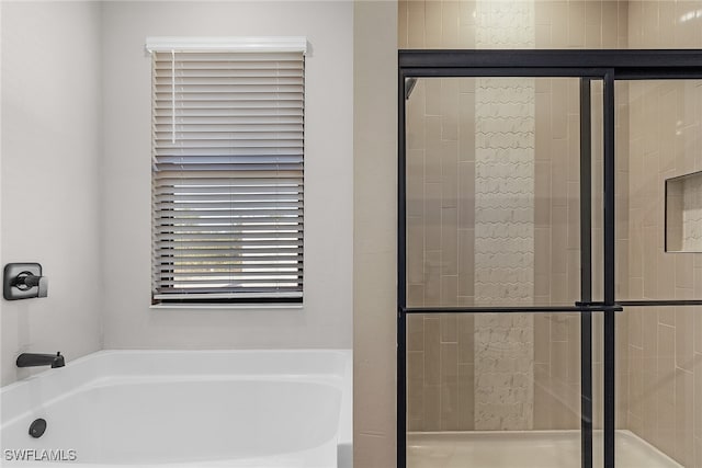 1705 SW 13th St, Cape Coral, FL 33991 - bathroom featuring a garden tub and a shower stall