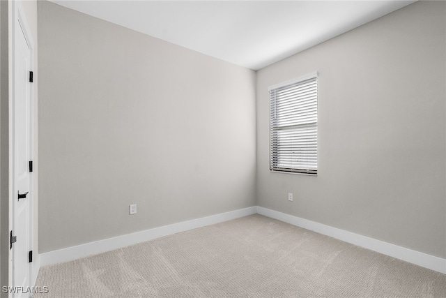 1705 SW 13th St, Cape Coral, FL 33991 - carpeted spare room with baseboards