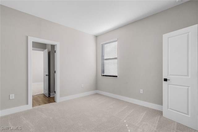 1705 SW 13th St, Cape Coral, FL 33991 - unfurnished bedroom featuring carpet and baseboards