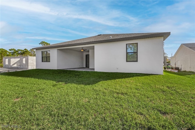 1705 SW 13th St, Cape Coral, FL 33991 - rear view of house featuring ceiling fan, stucco siding, and a patio area