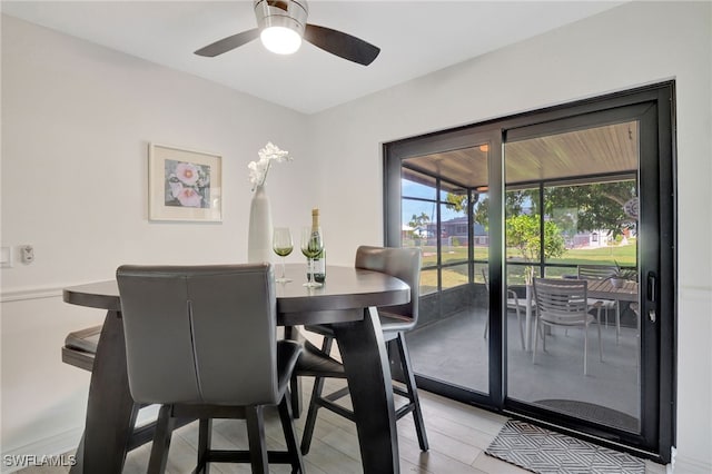 dining area with a ceiling fan