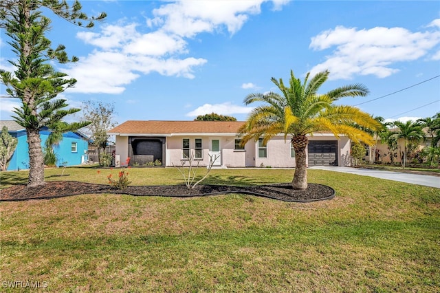 ranch-style house with a front yard, driveway, an attached garage, and stucco siding