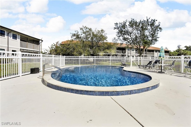 community pool with fence