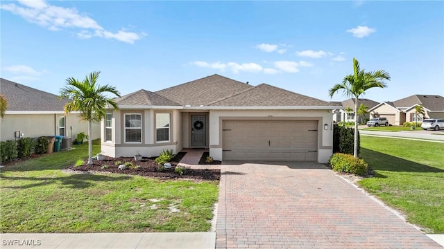 single story home featuring decorative driveway, roof with shingles, stucco siding, an attached garage, and a front yard