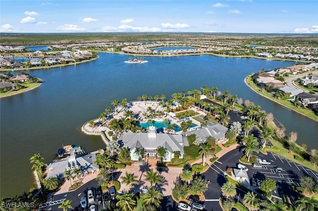 drone / aerial view with a water view