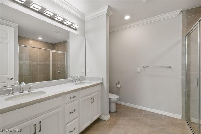 full bath with a stall shower, a sink, and crown molding