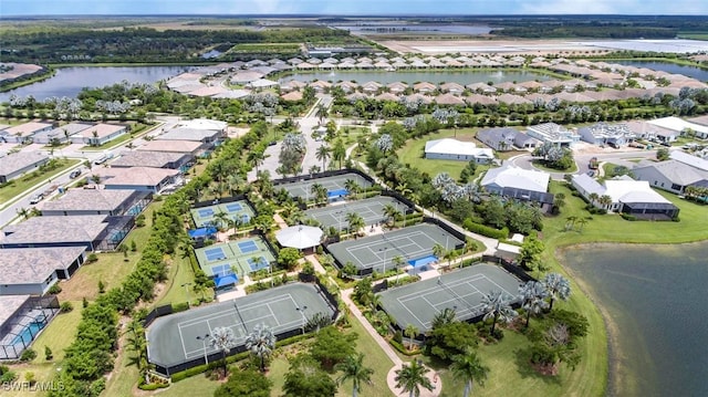 bird's eye view featuring a residential view and a water view