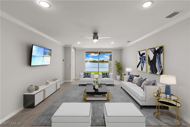 living room featuring baseboards, recessed lighting, visible vents, and crown molding