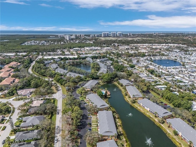 aerial view featuring a water view and a residential view