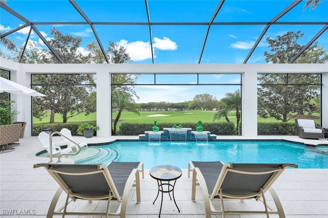 outdoor pool with glass enclosure, a patio, and view of golf course