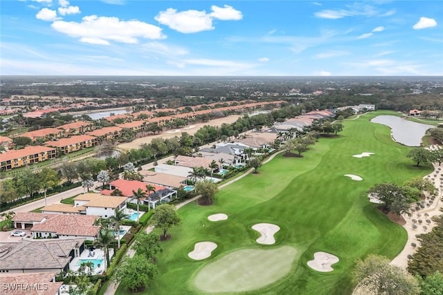 birds eye view of property featuring view of golf course